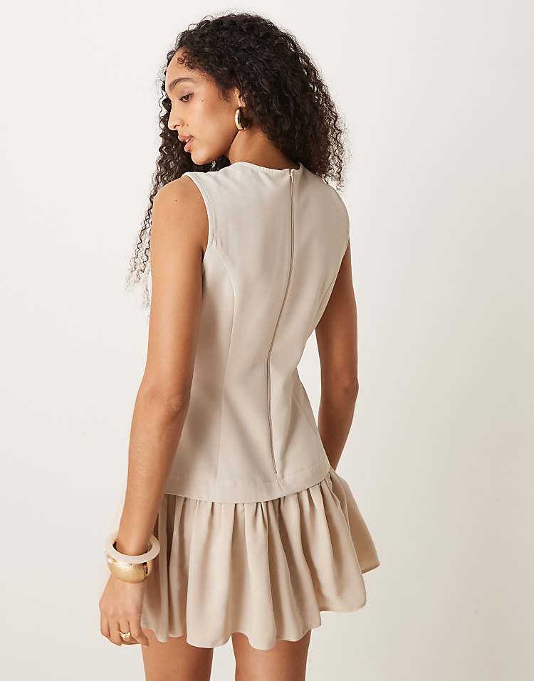 https://images.asos-media.com/products/asos-design-2-in-1-vest-mini-dress-in-vanilla-cream/208369592-3?$n_750w$&wid=750&fit=constrain