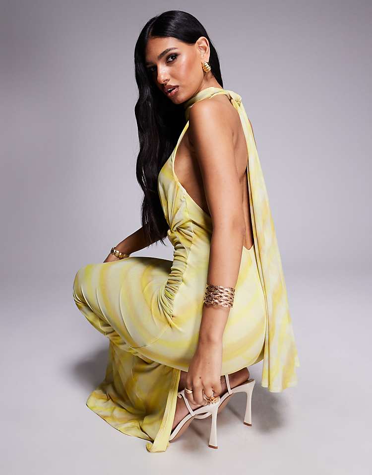 https://images.asos-media.com/products/asos-design-twist-bust-detail-tie-back-halter-neck-maxi-dress-in-blurred-striped-print/208468871-1-print?$n_750w$&wid=750&fit=constrain