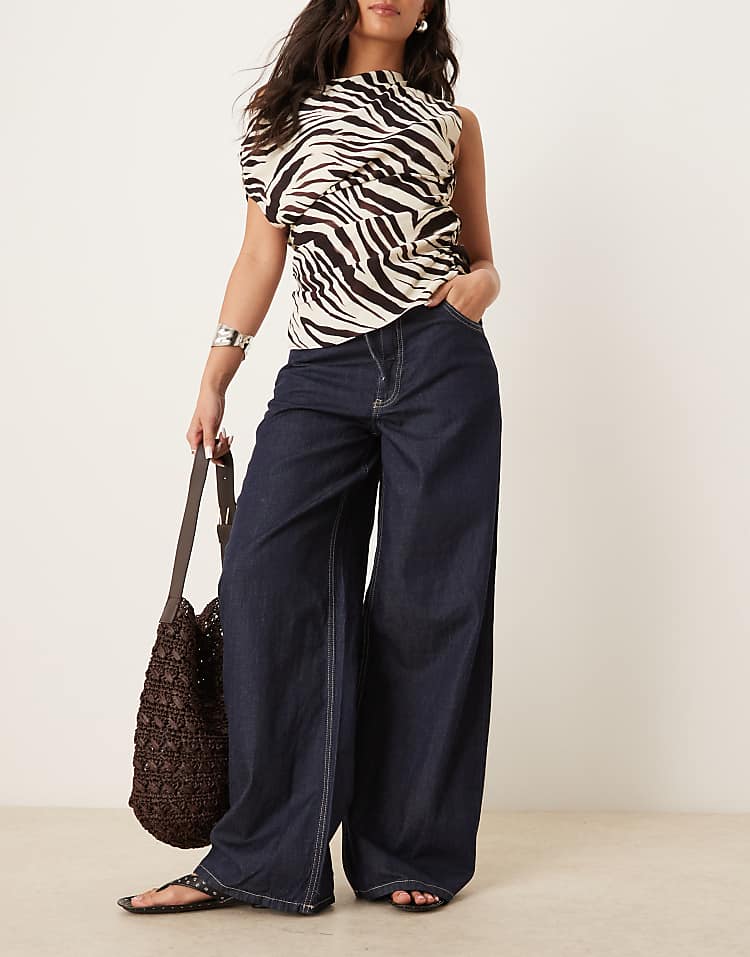 https://images.asos-media.com/products/mango-linen-mix-denim-look-elastic-waist-wide-leg-pants-in-dark-blue/208483360-1-darkblue?$n_750w$&wid=750&fit=constrain