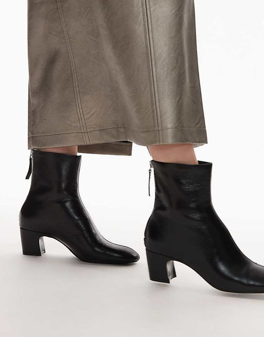 https://images.asos-media.com/products/mango-leather-round-toe-boots-in-black/207707311-2?$n_750w$&wid=750&fit=constrain